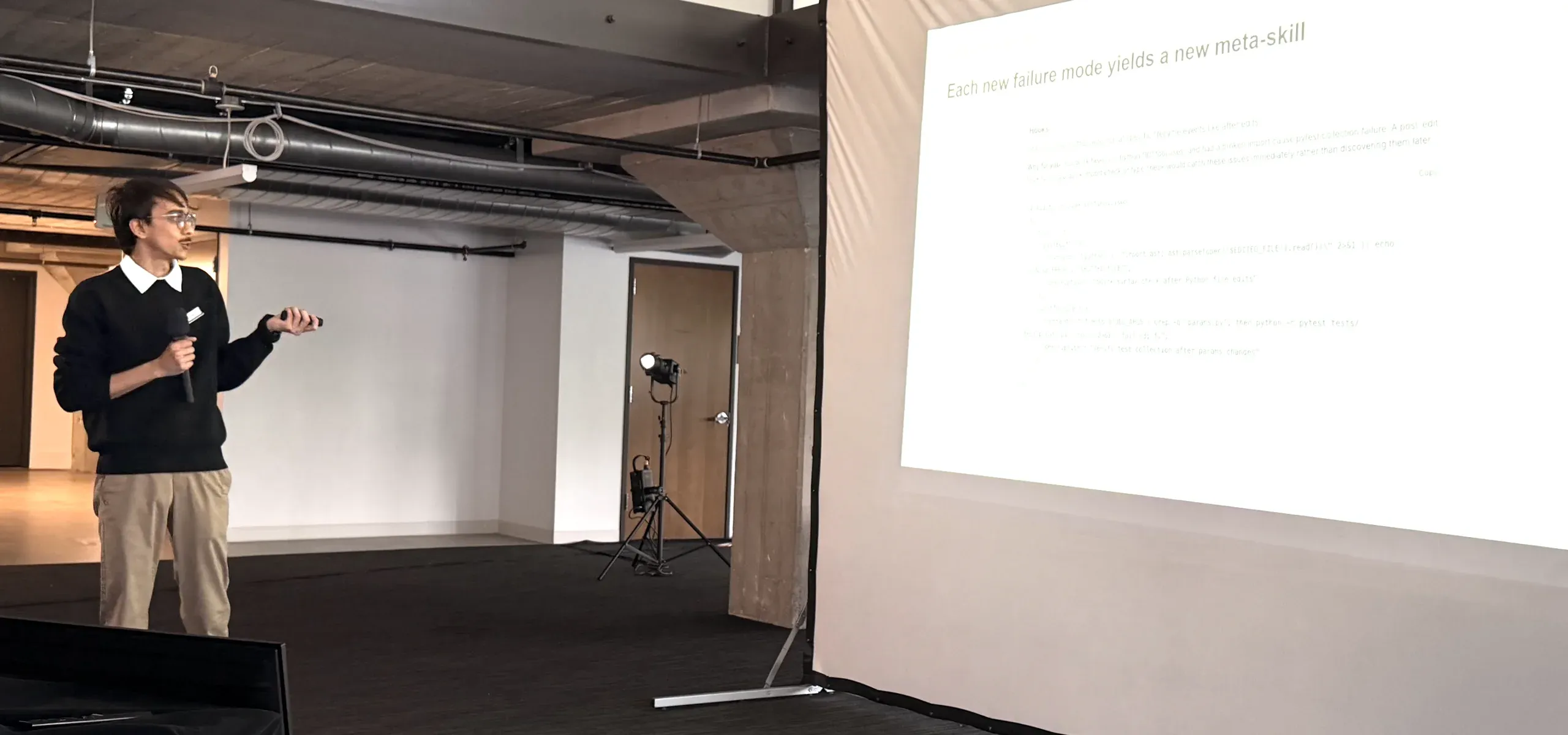 Mohammad Ahsan Fuzail presenting "Dig Deep, Level Up" on stage at the AI Science Summit
